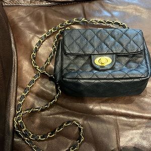 Fashion inspired crossbody bag. Perfect size for day or night